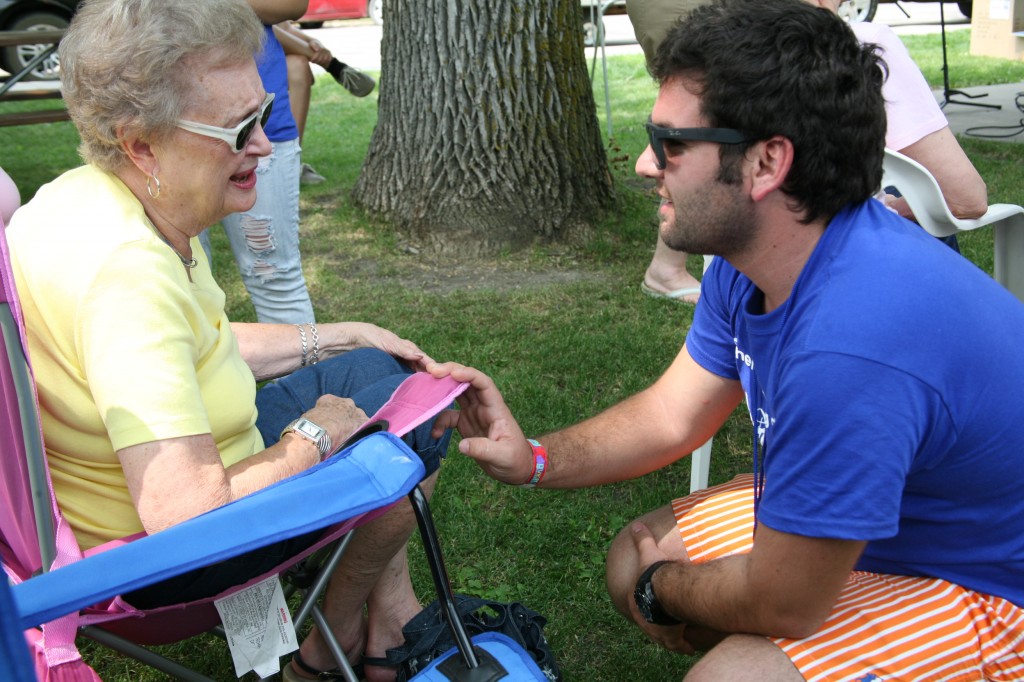 CAEP agriculture intern from Brazil visiting with local woman